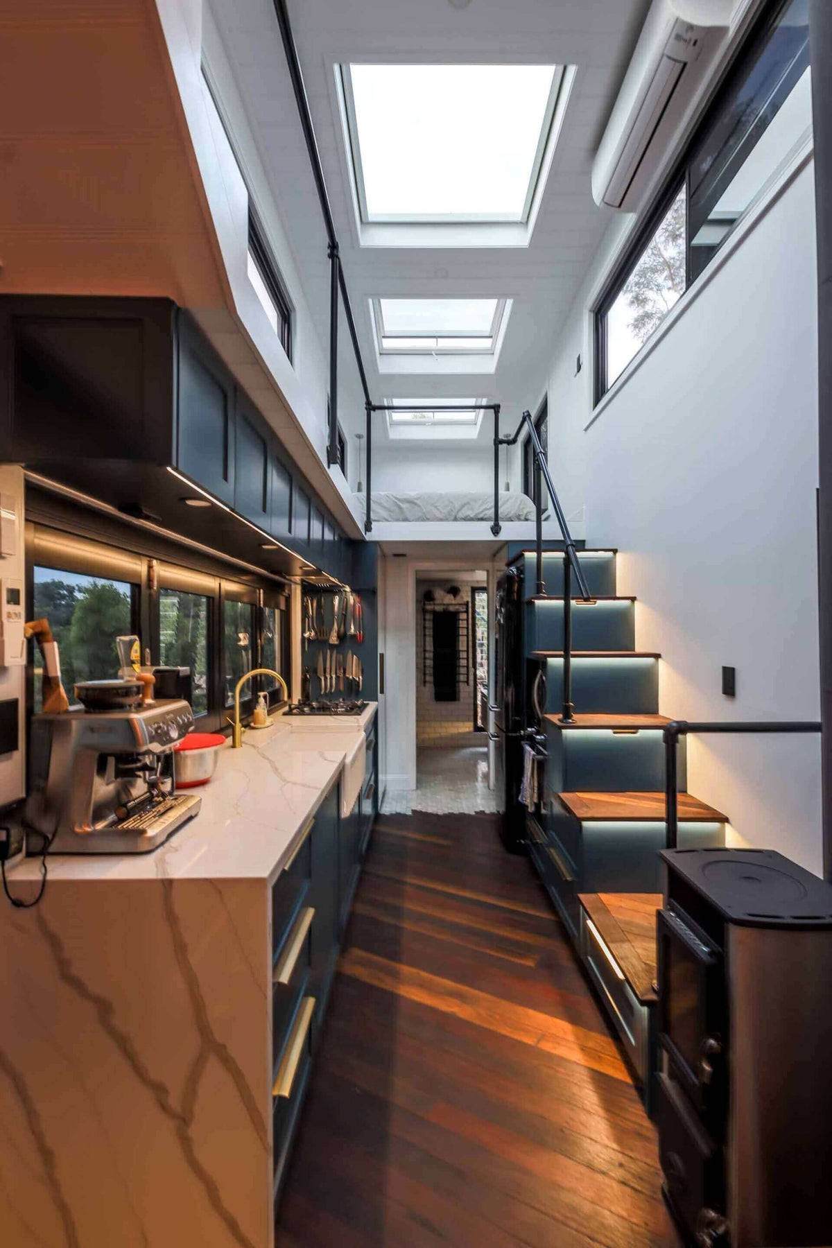 Interior view of an Aluminum Tiny House Trailer 6 meters by 2.4 meter duel Axel aluminum with modern design.