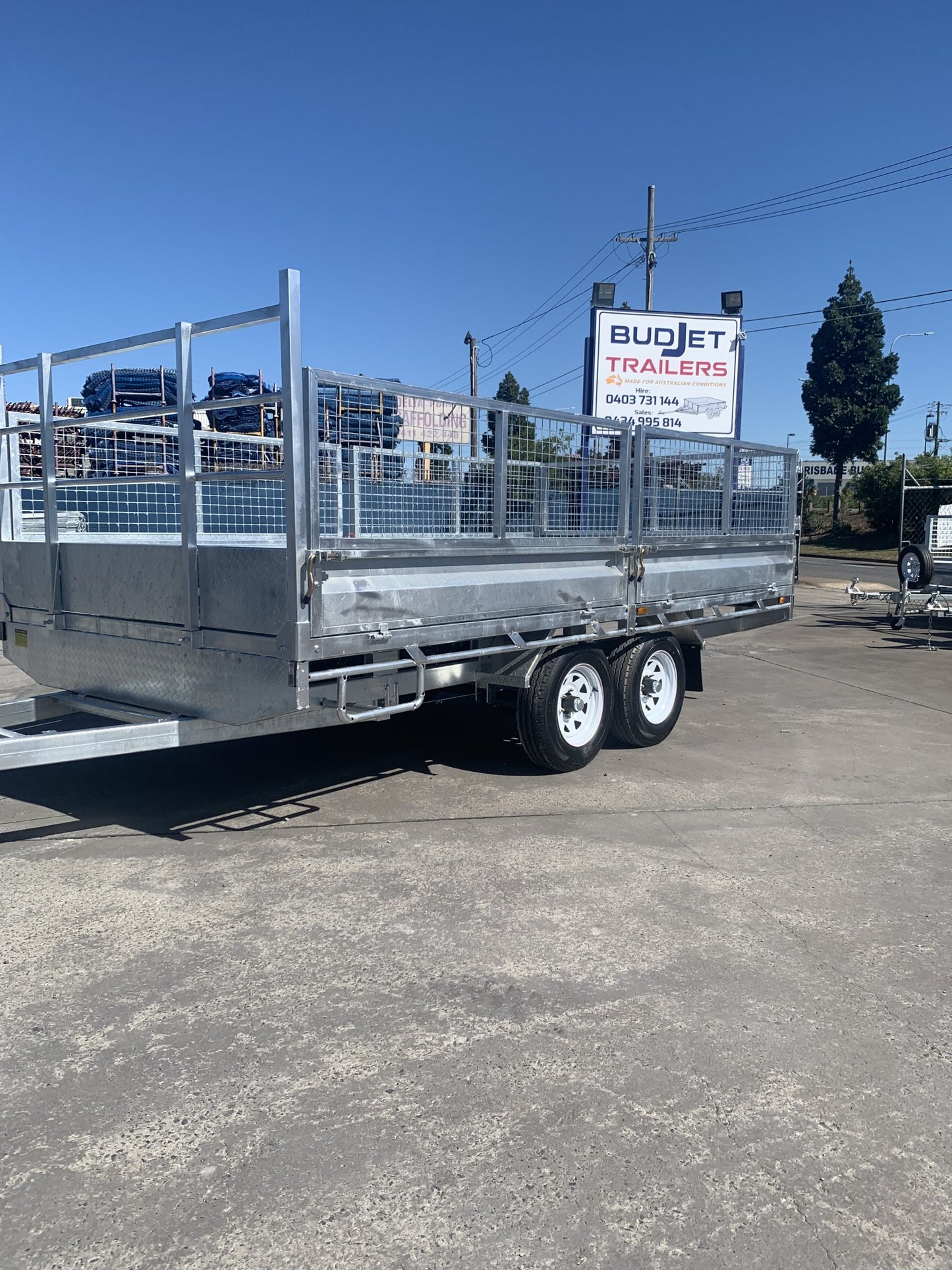 Flat Top Trailers 14 x 7 ft Tandem Flat Deck Trailer with Loading Ramps and cage ATM 3500kg Galvanized QLD