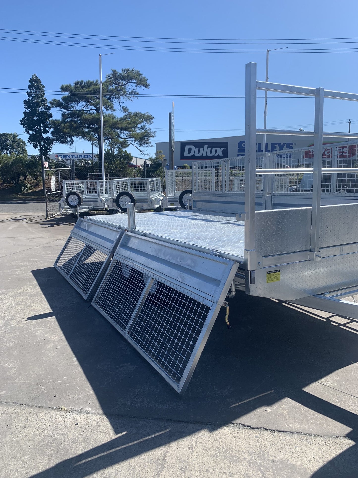 Flat Top Trailers 14 x 7 ft Tandem Flat Deck Trailer with Loading Ramps and cage ATM 3500kg Galvanized QLD