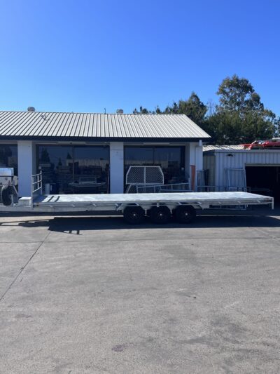 8M HYD TILTING FLAT TOP TRI AXLE TRAILER