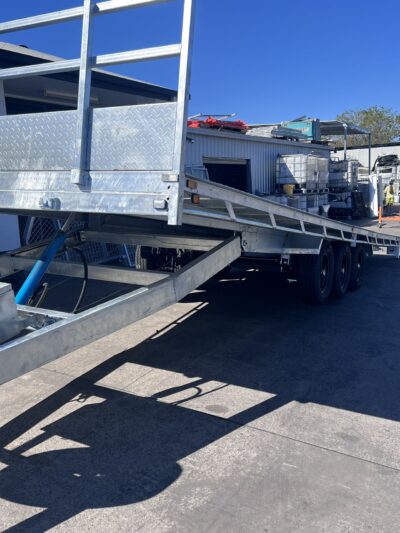 8M HYD TILTING FLAT TOP TRI AXLE TRAILER