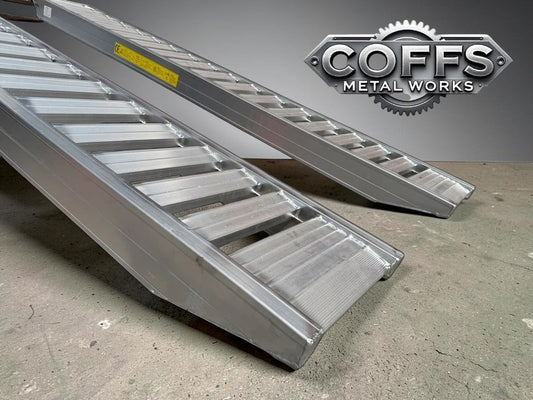 Coffs Metal Works 3-metre aluminium loading ramps with flat rungs, designed for 3-tonne capacity and rubber-tracked machinery.