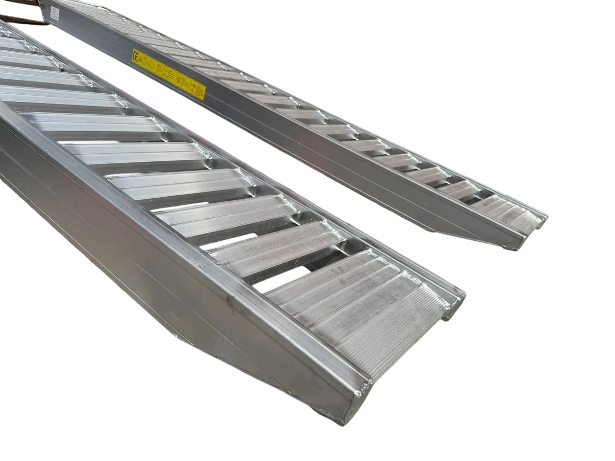 Coffs Metal Works 2.5m aluminium loading ramps with flat rung surface for rubber tracks and tyres. 3-tonne capacity.