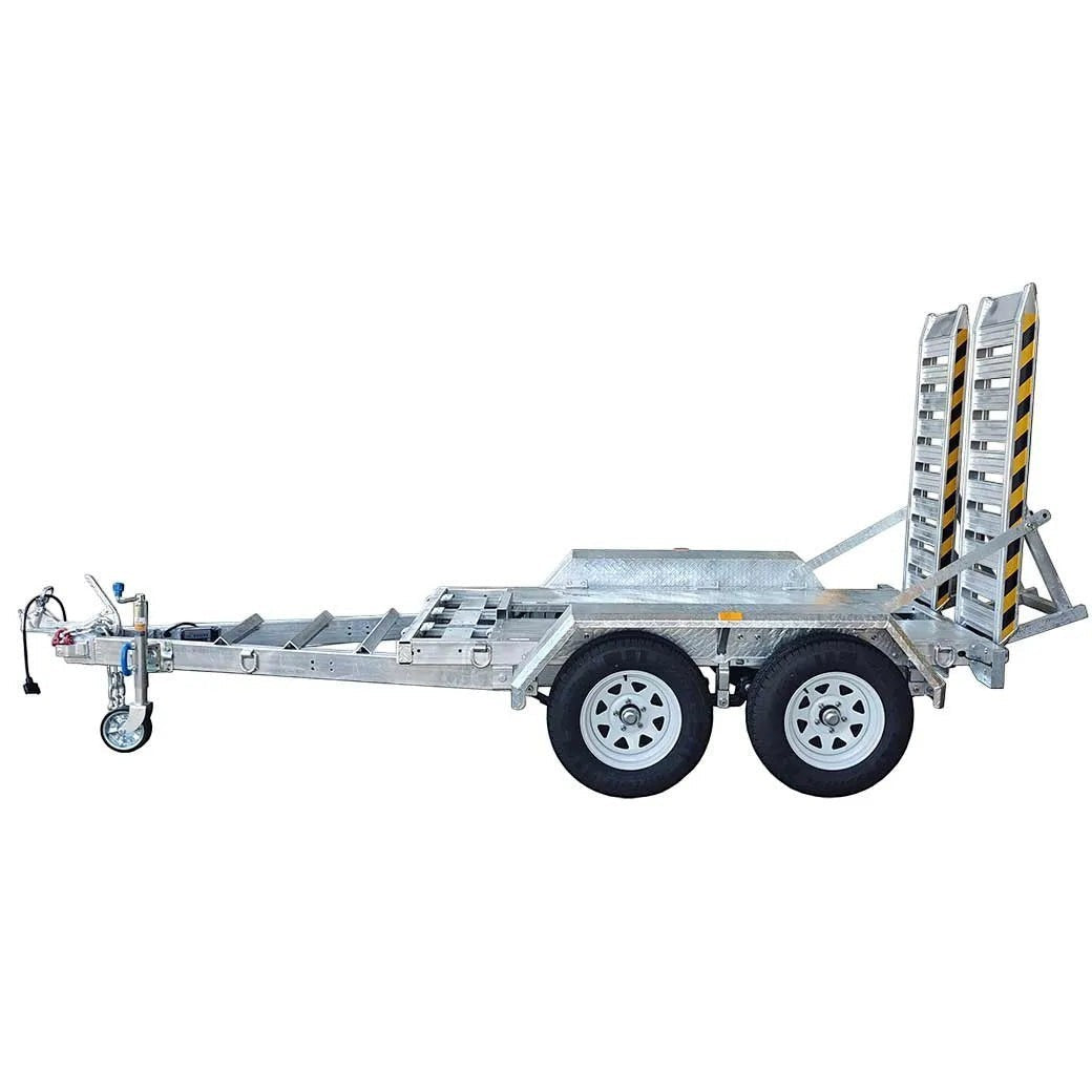 Coffs Metal Works dual axle plant trailer with checker-plate flooring and aluminium loading ramps. Galvanised steel chassis.