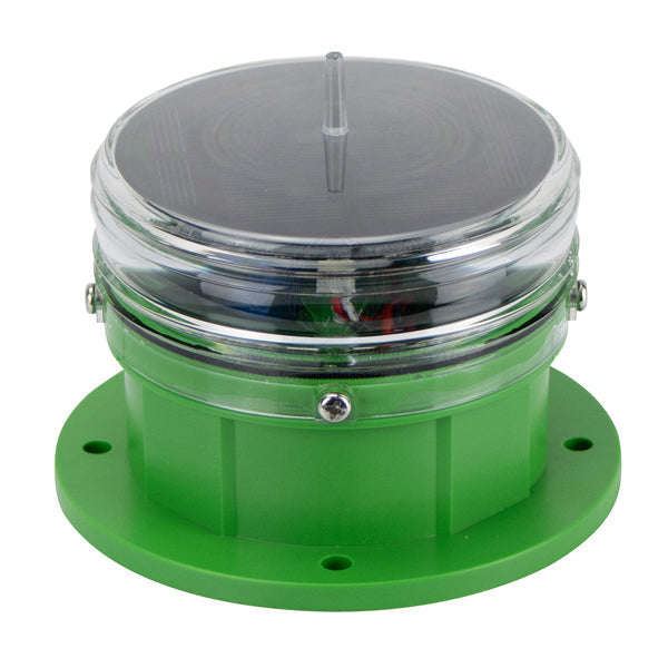 Coffs Metal Works solar powered marine navigation beacon light with a green base and clear protective lens.