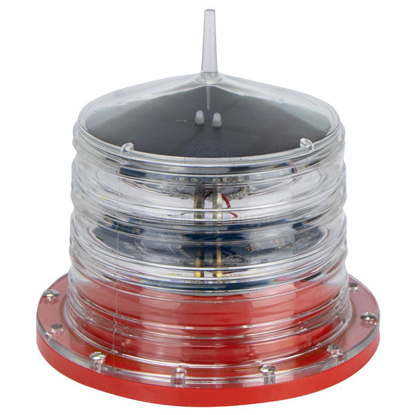 Coffs Metal Works solar powered marine navigation beacon with a clear lens and red base for channel marking.