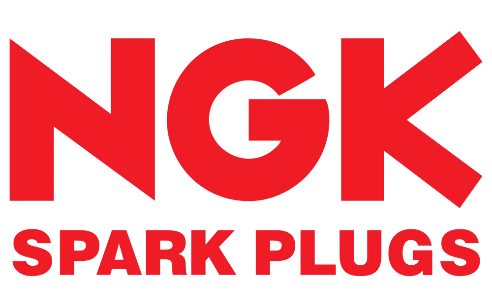 Red ngk spark plugs logo with bold, blocky lettering against a black background.