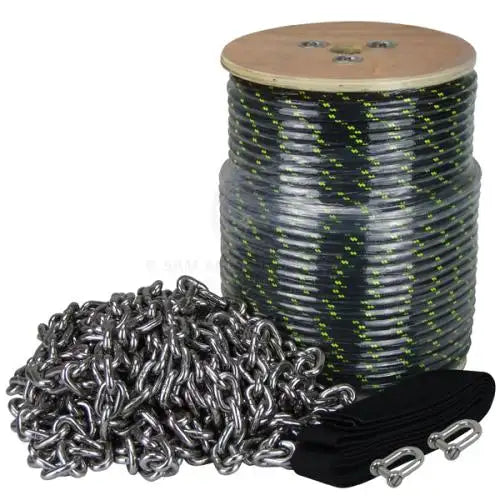 A spool of black and green braided rope with a wooden core, accompanied by a pile of silver metal chains and two black fabric straps with metallic buckles.