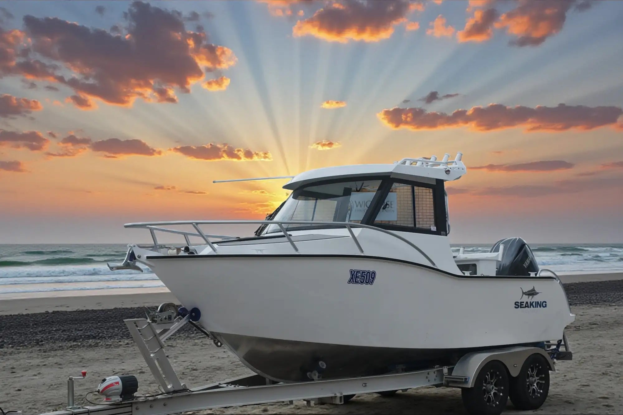 White seaking xe509 fishing boat with a sleek, modern design and black trim details.